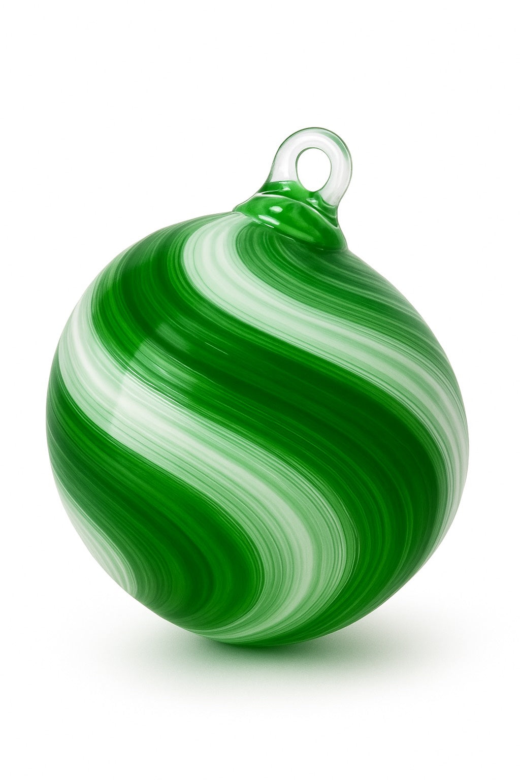 Green and white swirled glass ornament crafted by Puget Sound Glassblowing Studio on a white background