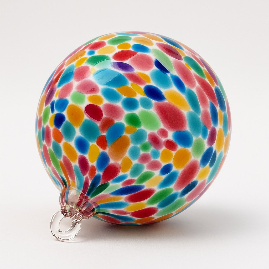 Hand-blown multi-color confetti glass ornament with blue, Pink, yellow, Green, and white flecks from Puget Sound Glassblowing Studio. 