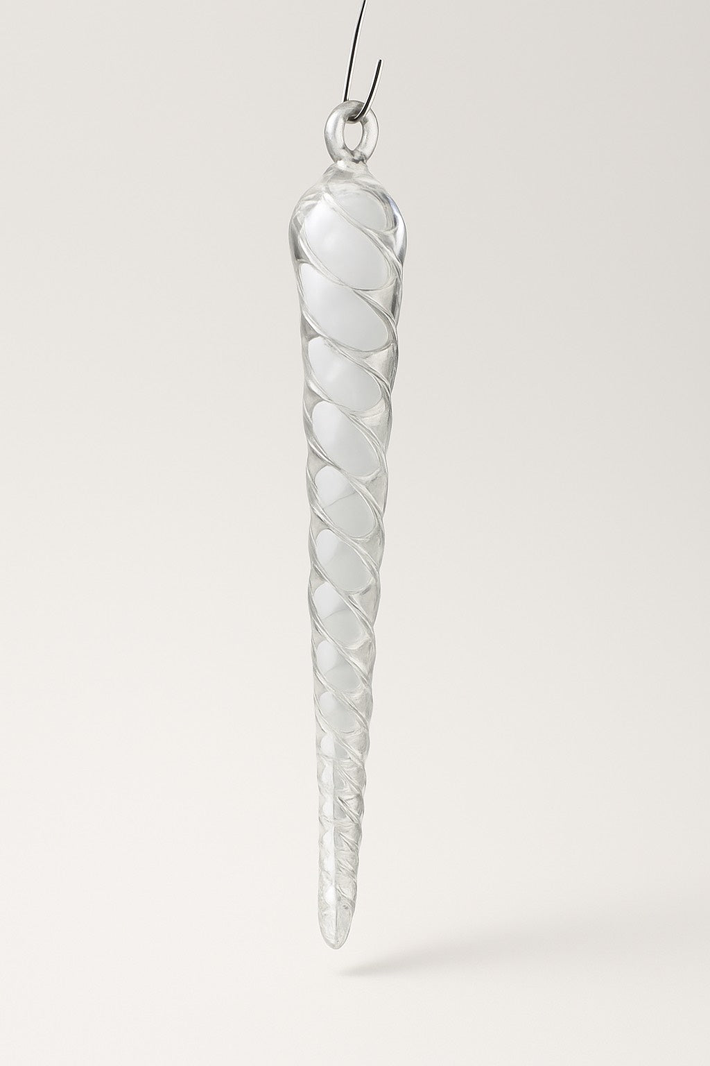 Hand-blown clear glass icicle ornament with twisted design from Puget Sound Glassblowing Studio.